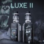 Two Luxe Ii Vape Mods with Tall Clear Tanks and Chrome Tops Set Against a Dark Background One Showing a 220w Display - Australia E-cigarette Store