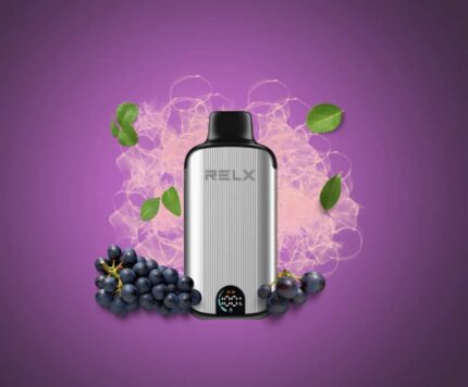 Silver vape device with black mouthpiece, surrounded by grapes and green leaves against a purple background.