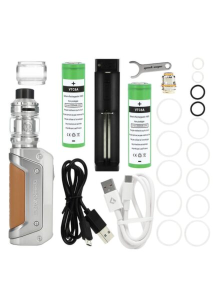Vape starter kit: metallic mod, glass tank, two green rechargeable batteries, USB charger, coil, seals, and spare rings.
