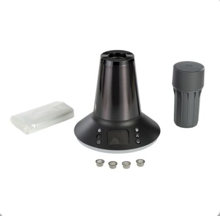 Electric coffee grinder with a conical grinding unit, base controls, a detachable cap on the right, a pack of filter bags on the left, and four metal filter cups in front.