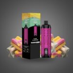 Pink Vape Pen Beside Its Black Packaging Labeled Gum Flavor 15000 Pro Max with Colorful Gummy Candies in the Background Against a Gray Gradient - Australia E-cigarette Store