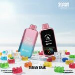 Two Pink-to-blue Disposable Vape Devices Standing on a White Surface Among Colorful Gummy Candies Labels Read 2000 Puffs Gummy Bear with Bimo Branding - Australia E-cigarette Store
