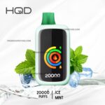 Hqd Mint-flavored Disposable Vape with Green Mouthpiece 20000 Puffs Surrounded by Mint Leaves and Ice - Australia E-cigarette Store