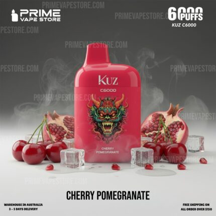 Red Kuz C6000 cherry pomegranate vape juice bottle standing on a white surface, surrounded by cherries, pomegranate halves, and ice cubes.