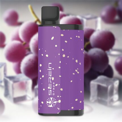 Purple spray bottle with a black cap and white speckle pattern, set against a blurred grape background.