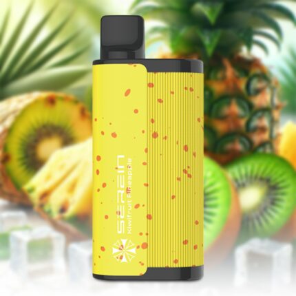 Yellow vape mod with black top, dotted with red specks, in a tropical outdoor setting.