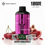 Pink and Black Vape Bottle Labeled Cherry Pomegranate Set Among Cherries and a Pomegranate Half Flavor-focused Product Image - Australia E-cigarette Store