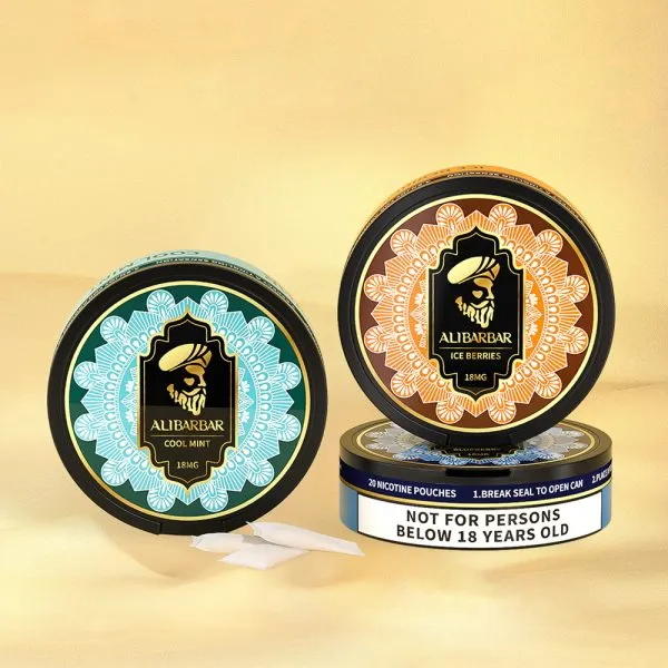 Humic-amino-shiny-balls-500x500-19webp - Australia E-cigarette Store Two Round Tins of Alibarbar Nicotine Pouches with Teal and Orange Mandala Designs One Tin Open Showing White Pouches and a Warning Label About 18+ Years - Australia E-cigarette Store